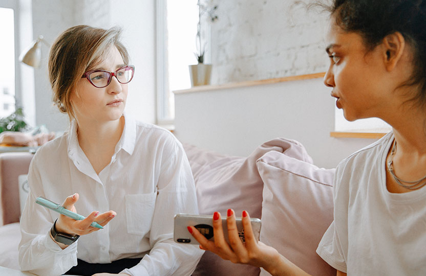 Two girls talking info-7