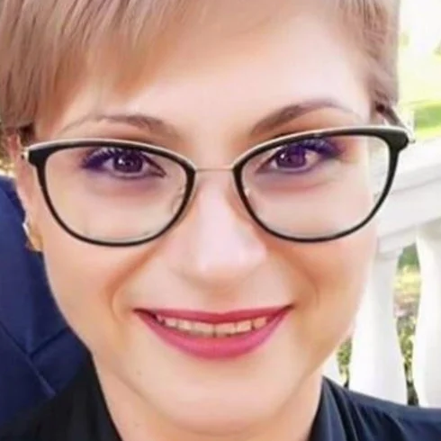 Dr. Raluca Tat
